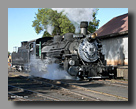 Photo: Cumbres & Toltec passes the Chama yard warehouse