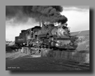 Photo: Cumbres & Toltec 487 belches smoke at the Chama ashpit
