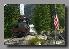 Photo: Georgetown Loop Shay 14 passes a flag placed at 'Lower Rockpile' in honor of the final day of ops